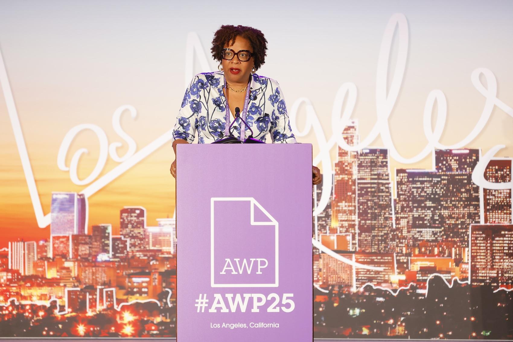 Tayari Jones speaking at #AWP25 podium with Los Angeles backdrop